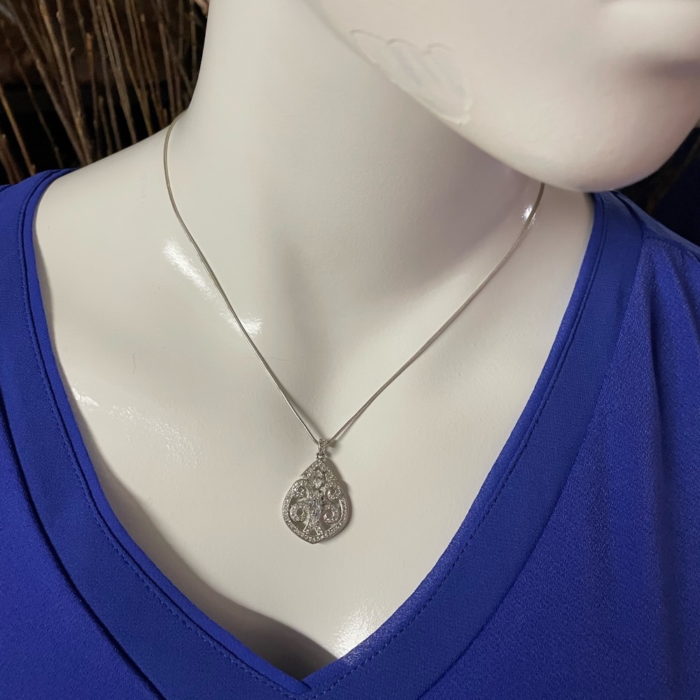 Ava nadri pendant with white stones
